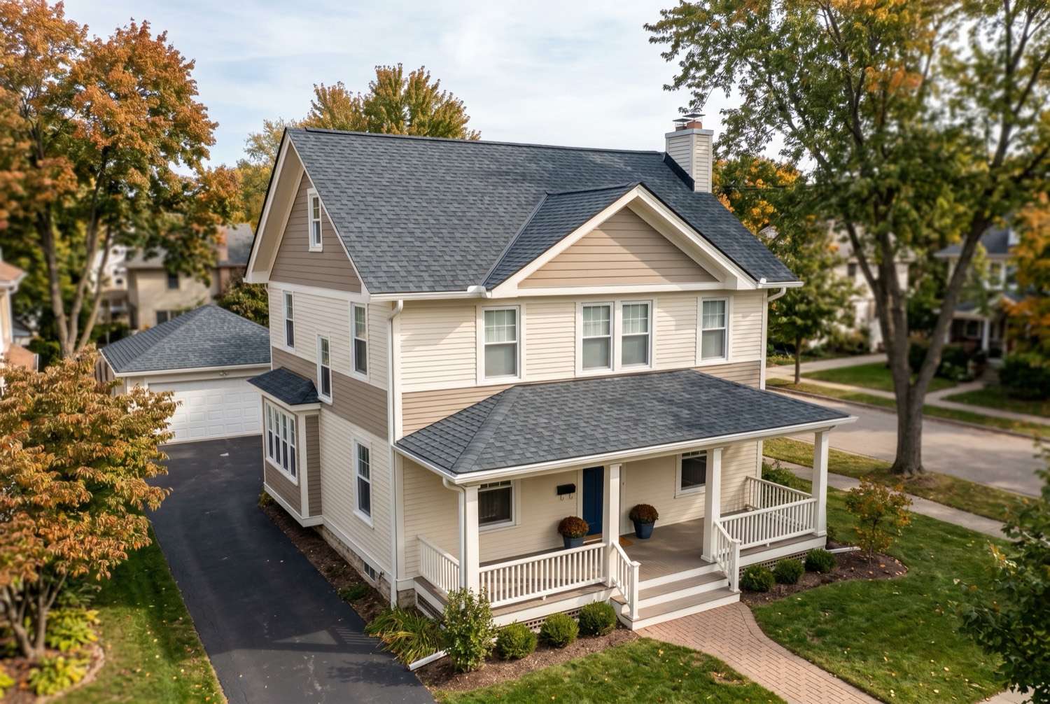 Home with a freshly installed dark architectural asphalt shingle roof